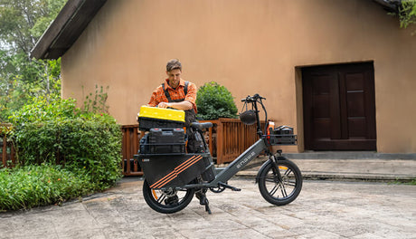 a man putting things on cargo e bike engwe le20