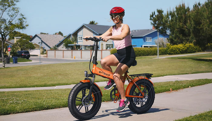  a woman riding on engwe ep-2 boost e bike with Boost Mode 