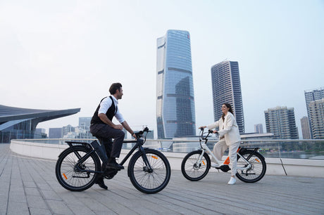2 people riding 2 engwe p275 e-bikes